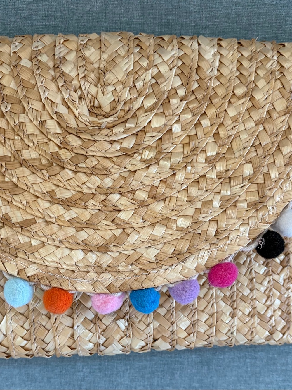 Mirale Straw Clutch with Colorful Pom-Pom Trim